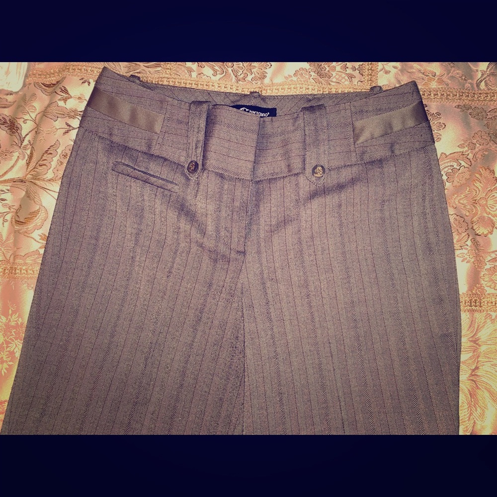 Tan and black crop dress pants.